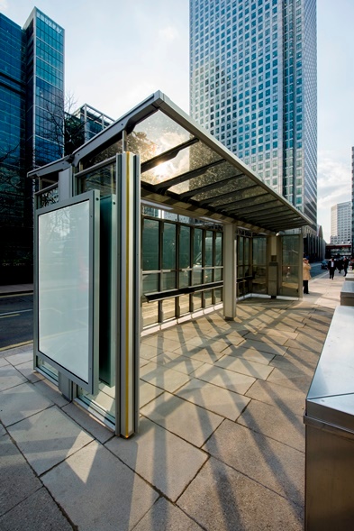 Bus shelter using solar glazing